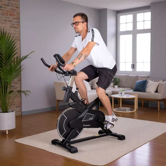 Rower treningowy spinningowy inSPORTline Alfan ∙ czarny ∙ opór manualny ∙ czujniki tętna ∙ uchwyt na tablet ∙ wyświetlacz LCD