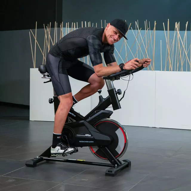 Rower treningowy spinningowy inSPORTline Alfan ∙ czarny ∙ opór manualny ∙ czujniki tętna ∙ uchwyt na tablet ∙ wyświetlacz LCD