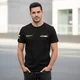 Koszulka bawełniana W-TEC Signature ∙ T-shirt ∙ z akcentem moto ∙ wygodna ∙ oddychający materiał ∙ luźny krój - Czarny - Czarny